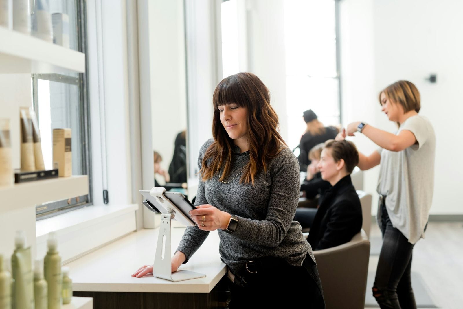 Studio owner reviewing bookings on a tablet
