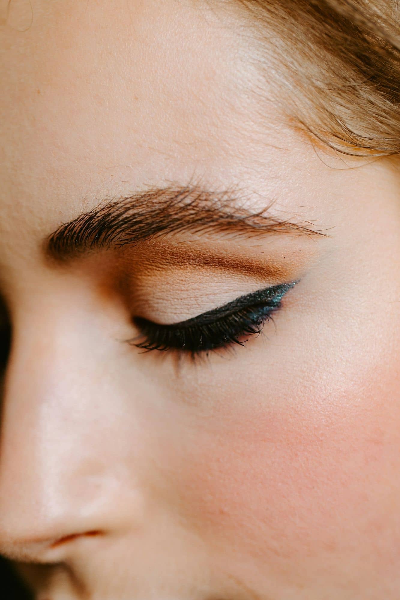Close-up of a shaped brow and defined eye