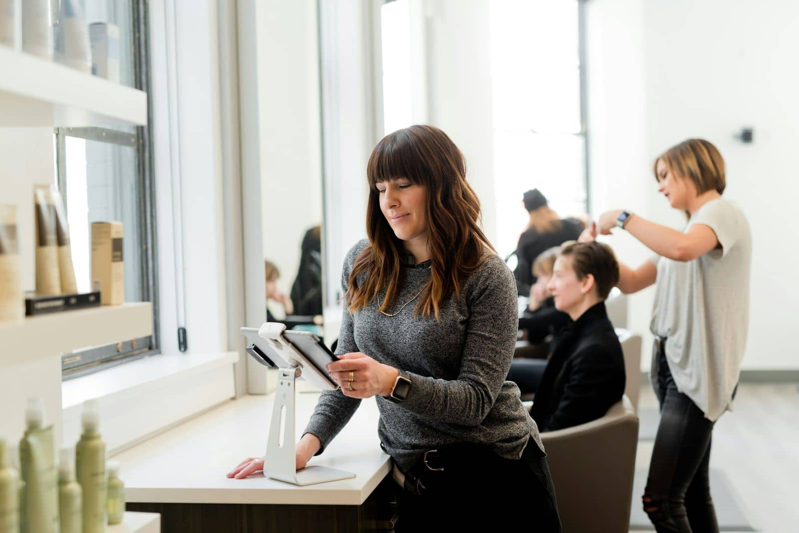Studio owner reviewing bookings on a tablet